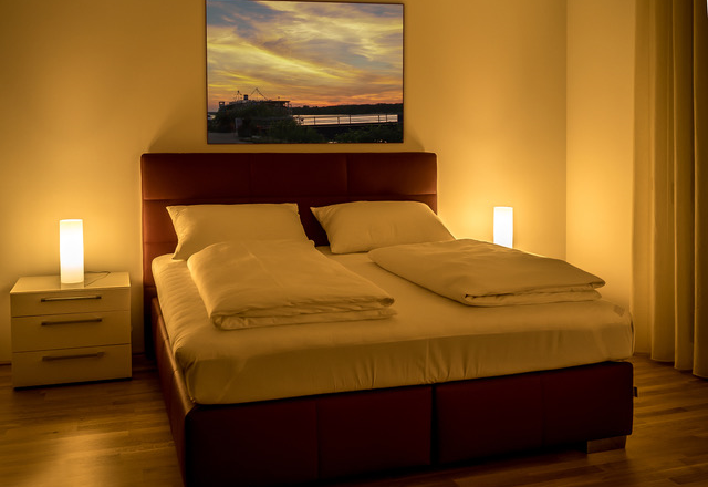 TDR-Fewo Rooftop Schlafzimmer, © Guestia GmbH Ein gemütliches Schlafzimmer mit Doppelbett