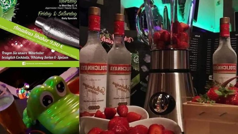 bar-amadeus, © Bar Amadeus Bar mit Wodkaflaschen, Erdbeeren und Mixer.