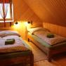 Schlafraum Einzel- oder Doppelbett, Ferienwohnung Jägerstube, © Marianne Schmid