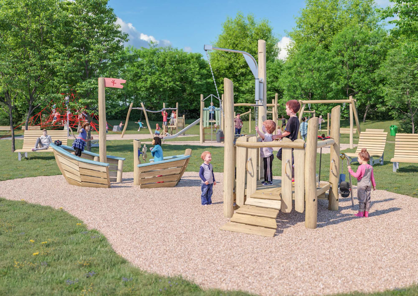 Kinder spielen auf dem großen Spielplatz mit Holzgeräten und Rutschen