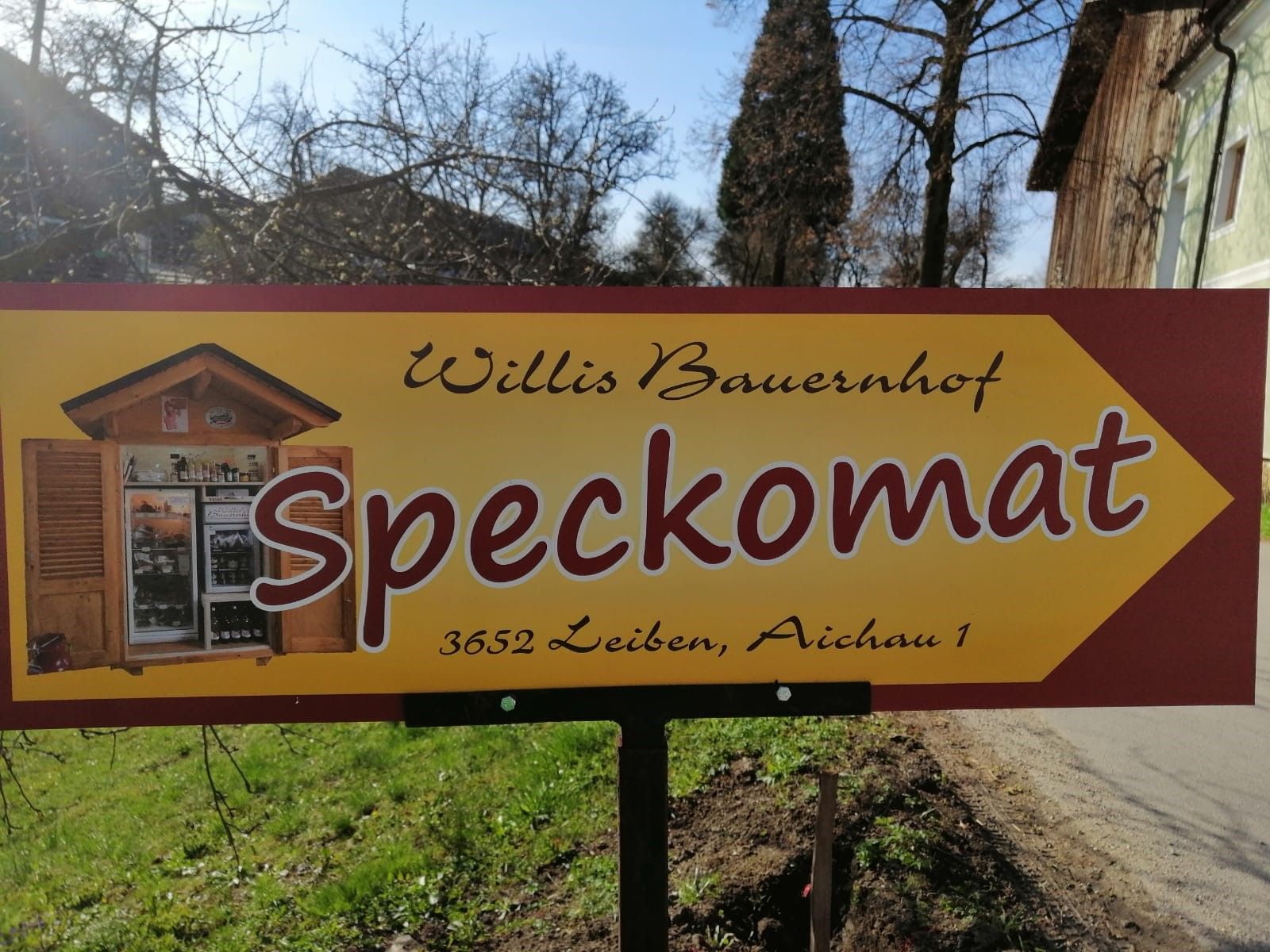 Wegweiser zum Selbstbedienungsautomaten der Famile Wilhelm