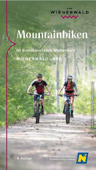 Coverbild: 2 Personen fahren auf ihren Mountainbikes durch den Wald. 