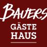 Logo mit dem Text 'Bauers G&auml;stehaus' in Wei&szlig; auf dunkelrotem Hintergrund.