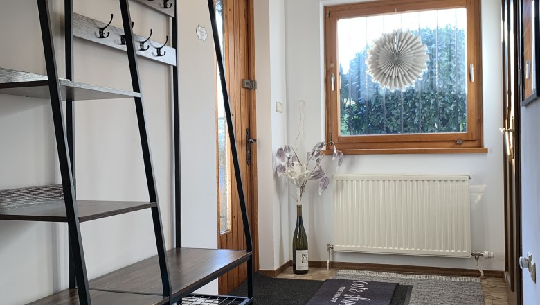 Corridor to the rooms with window