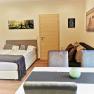 Wohnschlafraum mit Bett/Couch, © Apartment Sonne, Fotograf Mag. Verena Schrammel