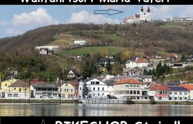 Blick auf Maria Taferl mit Kirche auf einem Hügel, darunter der Ort und ein Hinweis auf den Bikeshop Steindl.