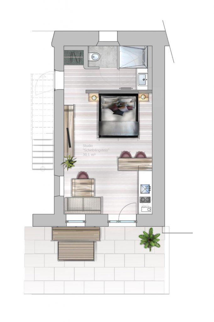 Grundriss eines 30 m² großen Studios mit Bett, Küche, Bad und Terrasse.