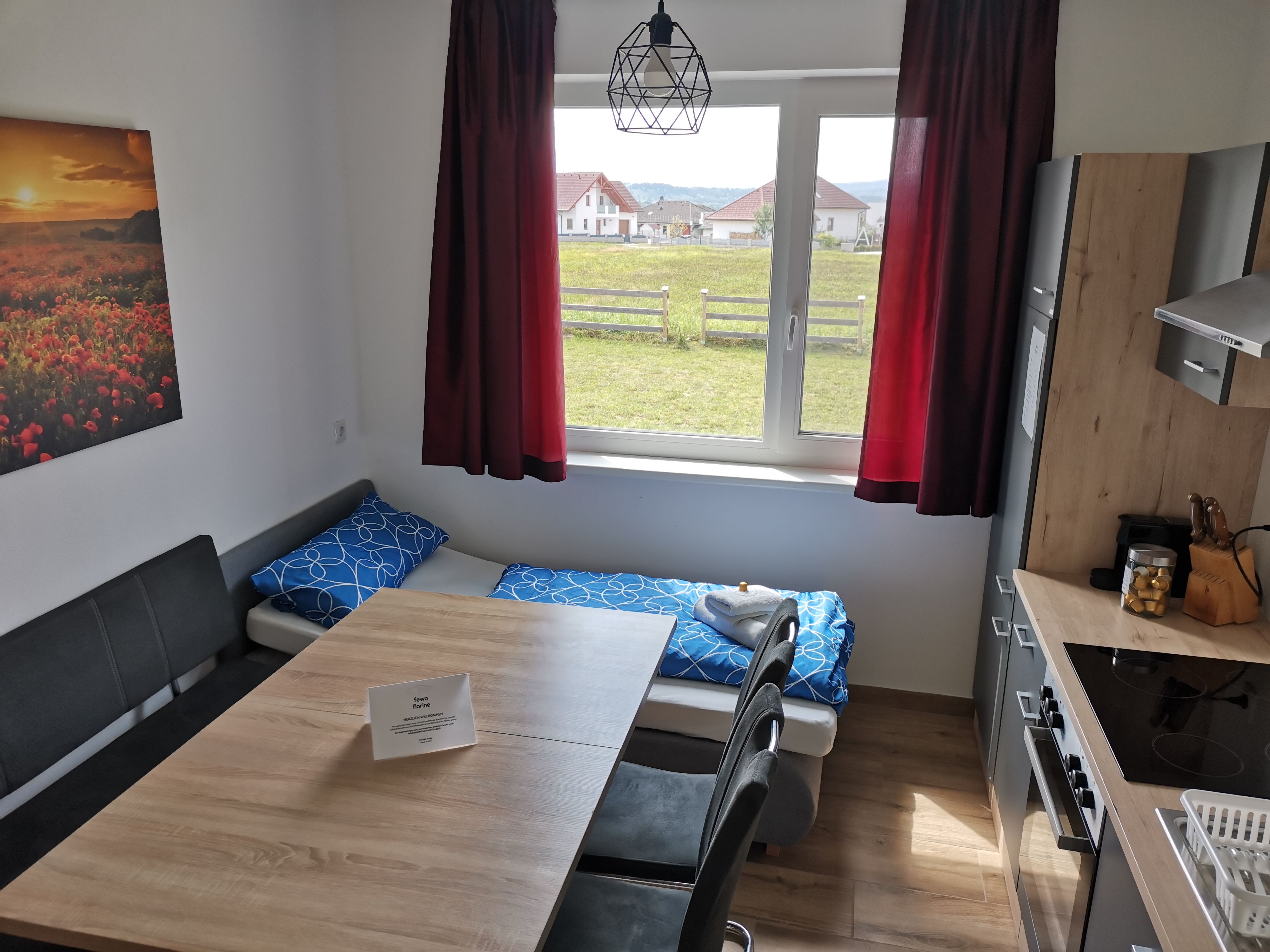 Wohnküche mit Bett